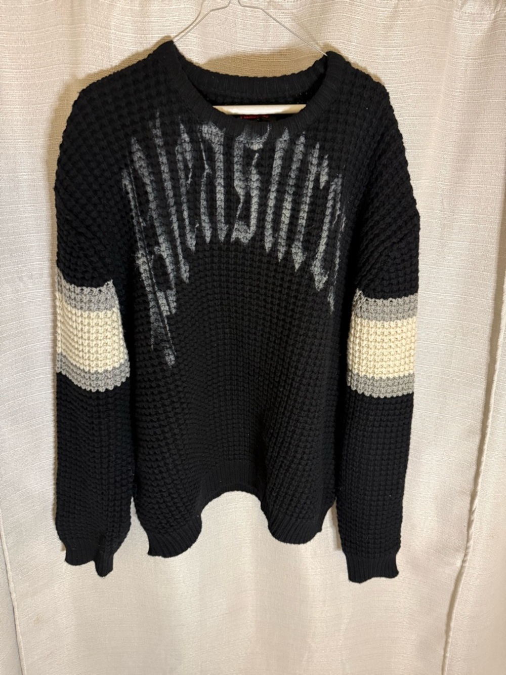 Black Waffle Knit Sweater with Cream & Gray Sleeve Bands